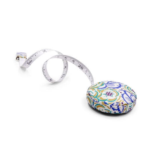 Auguste H. Thomas cream floral tape measure